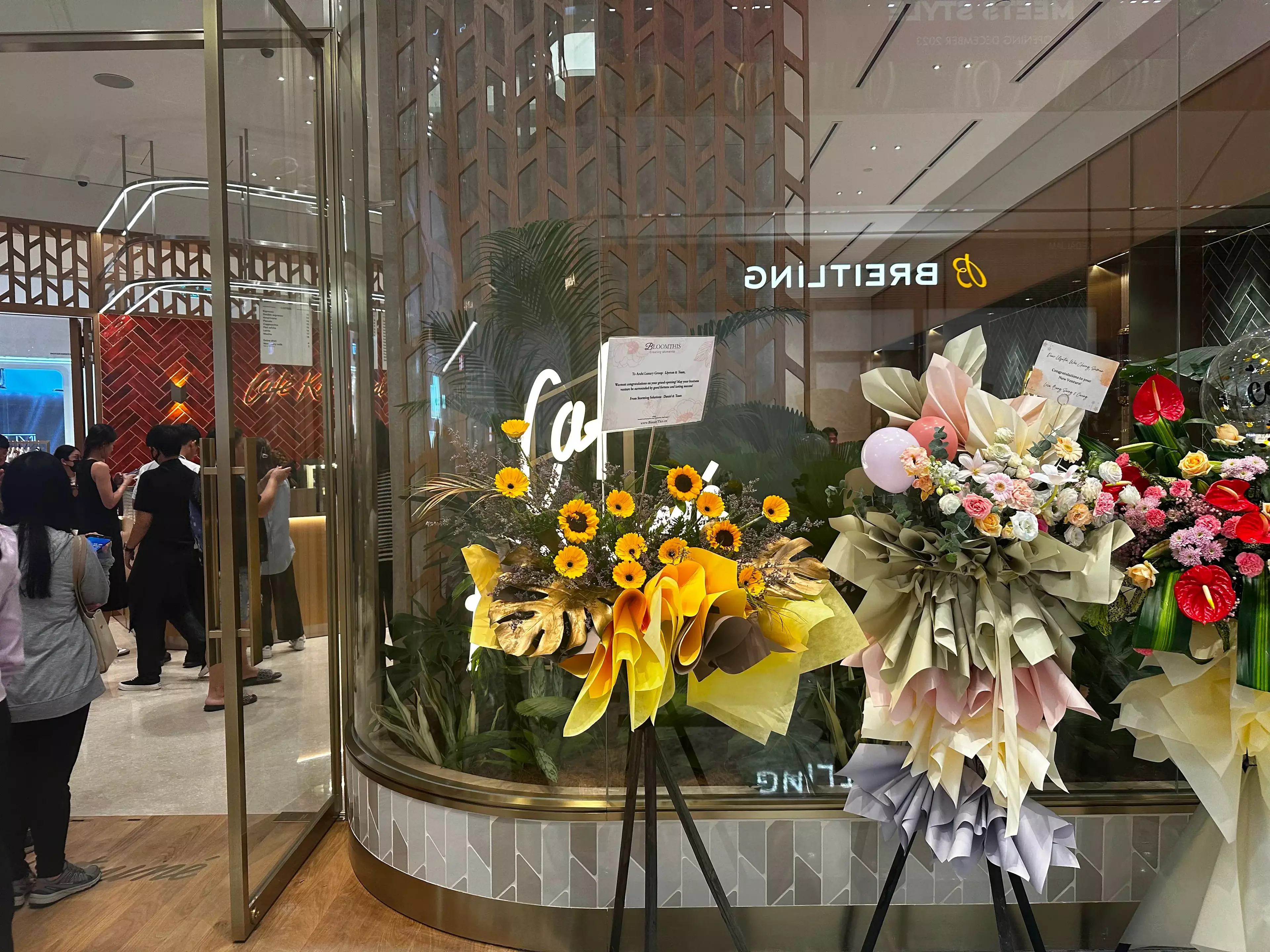 Congratulations in Bloom: An Array of Colorful Bouquets from Well-Wishers Adorning the Entrance of Cafe Kitsune, TRX, Kuala Lumpur